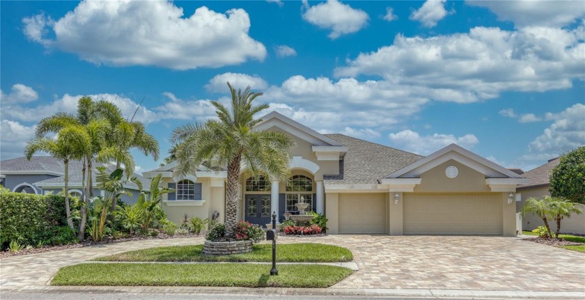 This stunning home is situated in the highly desirable Lansbrook - Beach Home for sale in Palm Harbor, Florida on Beachhouse.com