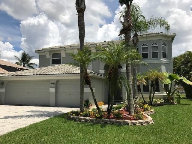 THIS STUNNING 5/3/3 ESTATE HOME IN LEGACY ESTATES HAS AN ELEGANT - Beach Home for sale in Lake Worth, Florida on Beachhouse.com