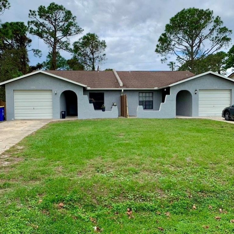 This duplex is perfect for owner-occupants looking to live in - Beach Townhome/Townhouse for sale in Edgewater, Florida on Beachhouse.com