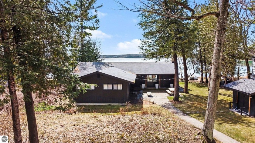 Freshly remodeled home with 100 feet of sandy beach frontage on - Beach Home for sale in Maple City, Michigan on Beachhouse.com