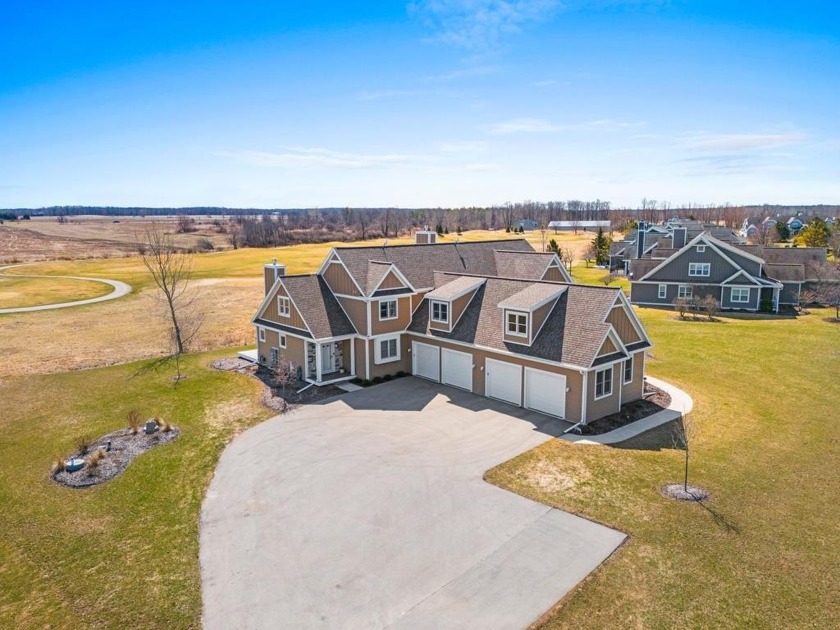 Step into a lifestyle of luxury  convenience with this fabulous - Beach Condo for sale in Egg Harbor, Wisconsin on Beachhouse.com