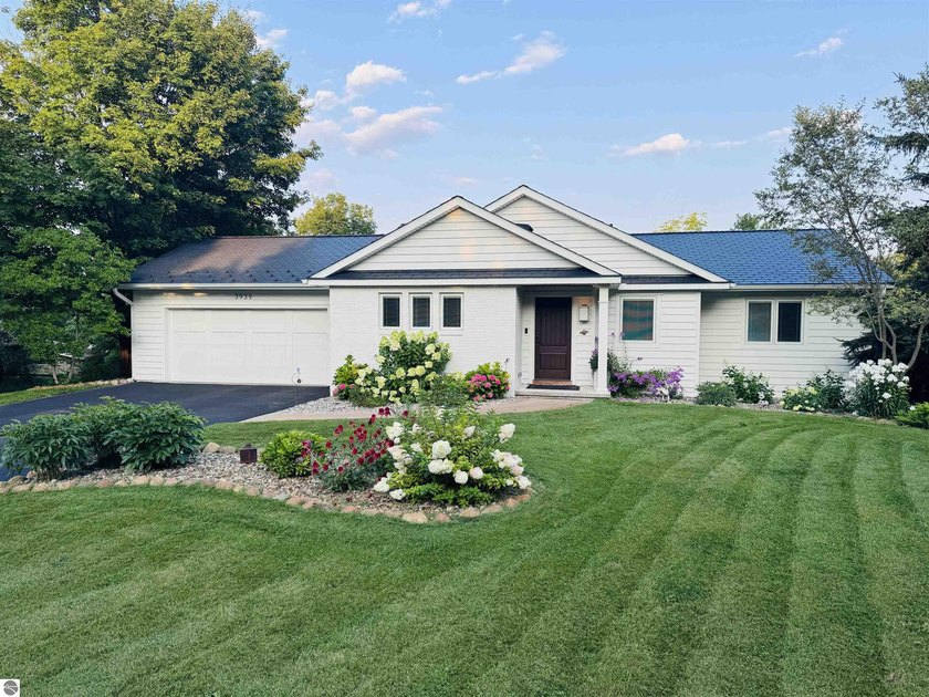 Old Mission Stunner. Perched high atop a private hilltop, where - Beach Home for sale in Traverse City, Michigan on Beachhouse.com