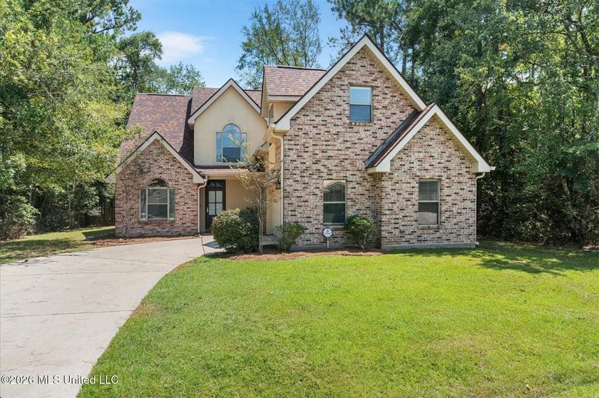 Welcome to 8313 Analii Street in Diamondhead! This beautifully - Beach Home for sale in Diamondhead, Mississippi on Beachhouse.com