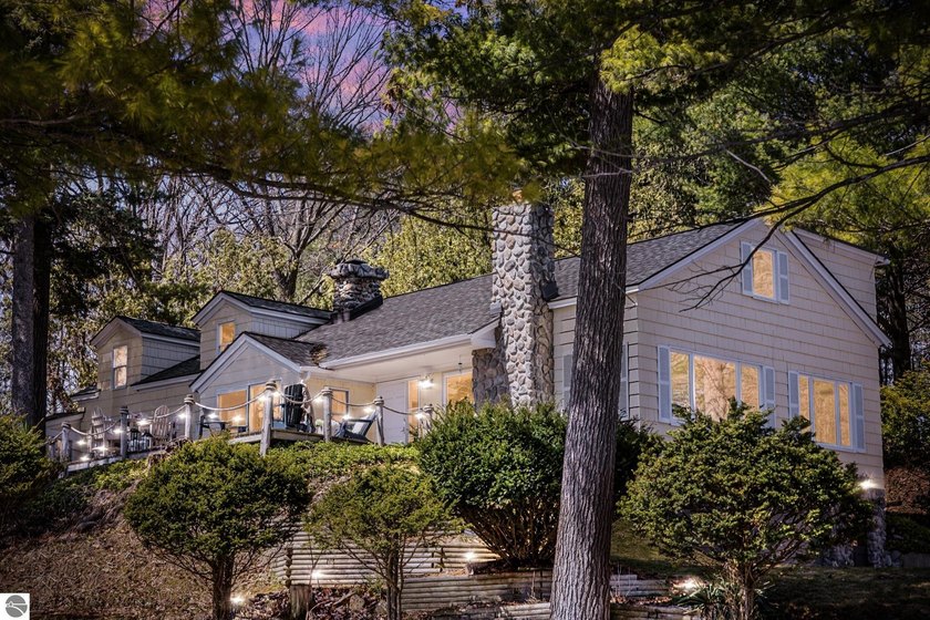 At the base of Old Mission Peninsula, where the shoreline - Beach Home for sale in Traverse City, Michigan on Beachhouse.com