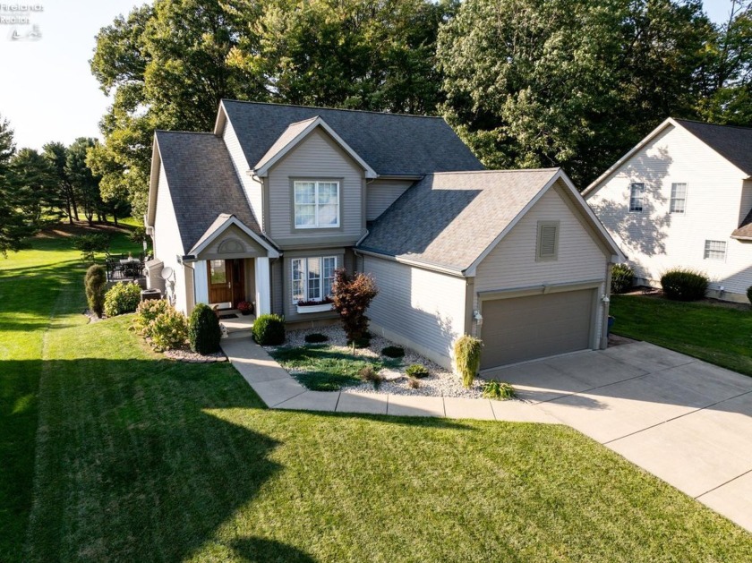 Nestled along the 10th hole of Thunderbird Golf Course, this - Beach Home for sale in Huron, Ohio on Beachhouse.com