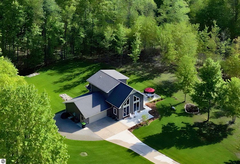 Some homes stand out for what they have. Others stand out for - Beach Home for sale in Cedar, Michigan on Beachhouse.com