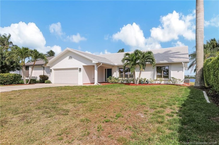 Neat and clean home with wide riverfront views situated in - Beach Home for sale in Palm City, Florida on Beachhouse.com