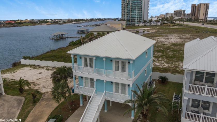 Welcome to paradise! This beautiful home is located in the - Beach Home for sale in Orange Beach, Alabama on Beachhouse.com