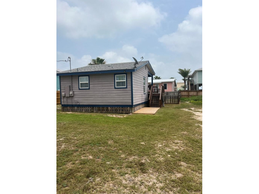 This adorable cozy coastal cottage sits on a large lot just 2 - Beach Home for sale in Rockport, Texas on Beachhouse.com