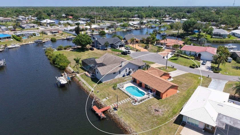 Tucked at the end of a QUIET CUL-DE-SAC, where traffic fades and - Beach Home for sale in Nokomis, Florida on Beachhouse.com