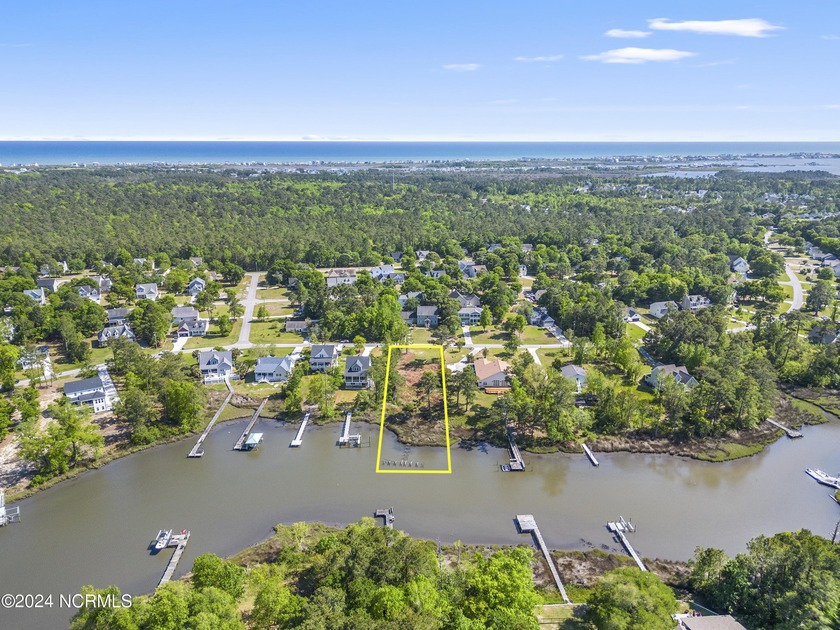 Check out this waterfront lot in the gated community of Chadwick - Beach Lot for sale in Sneads Ferry, North Carolina on Beachhouse.com