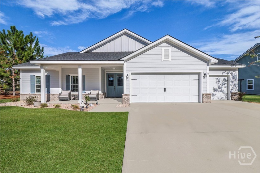 Welcome to this exceptional 1.5-story home located in a - Beach Home for sale in Richmond Hill, Georgia on Beachhouse.com