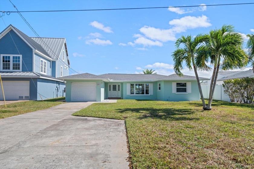 Discover the potential of this waterfront gem in the highly - Beach Home for sale in Indian Rocks Beach, Florida on Beachhouse.com