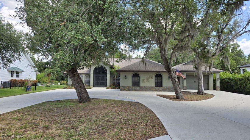 This 3 bedroom, plus office, 3 bath, 2 Car Garage (Epoxy coated) - Beach Home for sale in North Fort Myers, Florida on Beachhouse.com