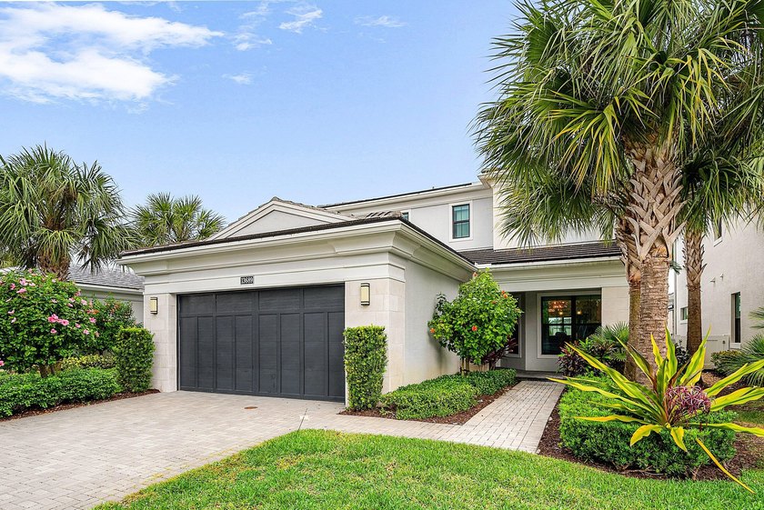 EXPANSIVE LAKEFRONT POOL HOME WITH DOWNSTAIRS PRIMARY SUITE - Beach Home for sale in Palm Beach Gardens, Florida on Beachhouse.com