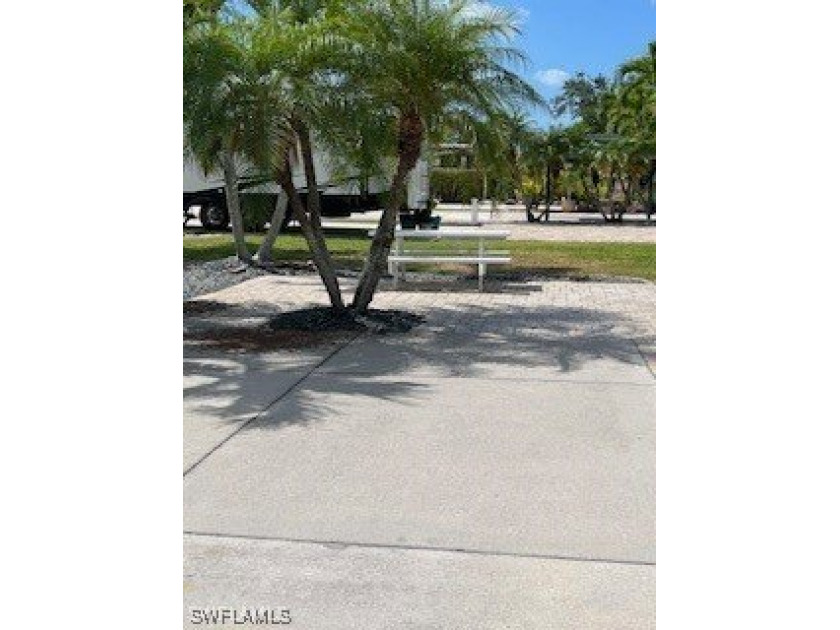 Experience the tranquility of a peaceful street surrounded by - Beach Lot for sale in Fort Myers Beach, Florida on Beachhouse.com