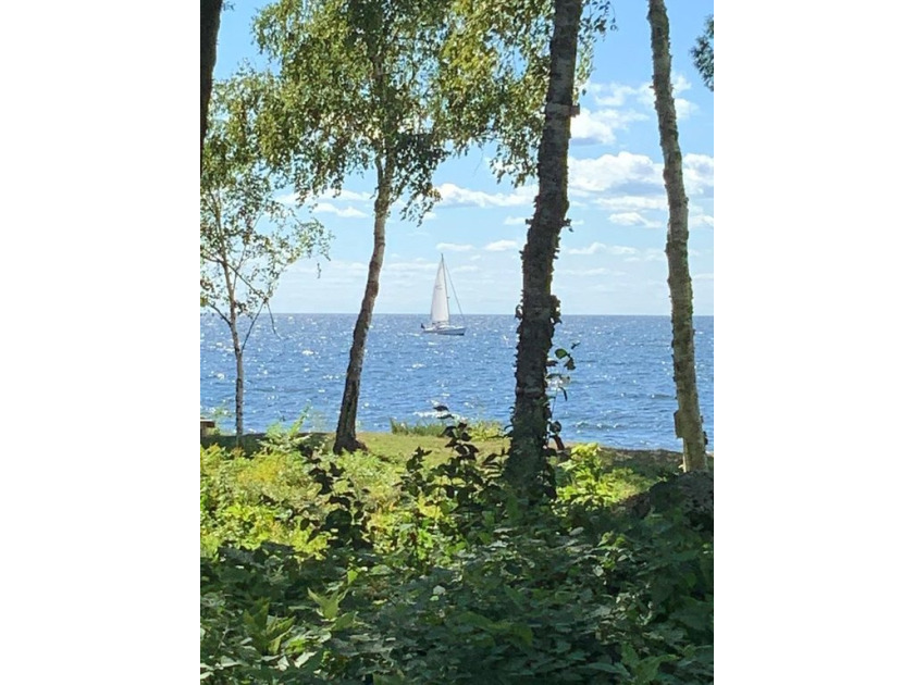 This stunning waterfront condo, with a sunset view, is being - Beach Condo for sale in Egg Harbor, Wisconsin on Beachhouse.com