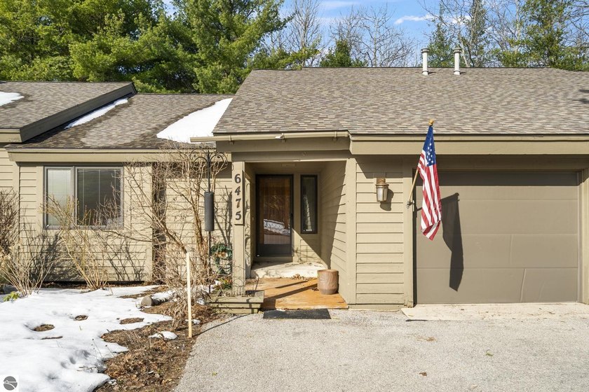 Opportunity awaits in this ideally located Port of Old Mission - Beach Condo for sale in Traverse City, Michigan on Beachhouse.com