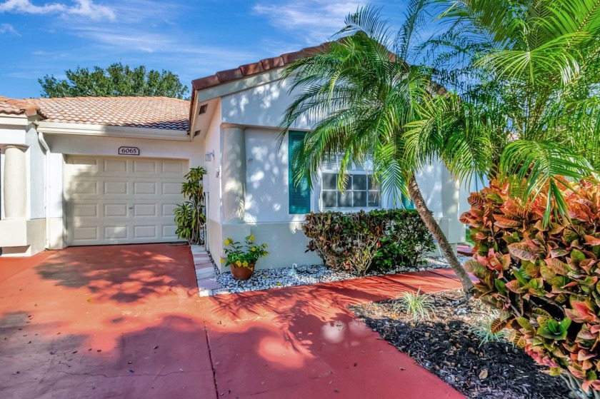 ENJOY ONE OF FLORAL LAKES LARGEST MODELS, WITH A PEACEFUL GARDEN - Beach Home for sale in Delray Beach, Florida on Beachhouse.com