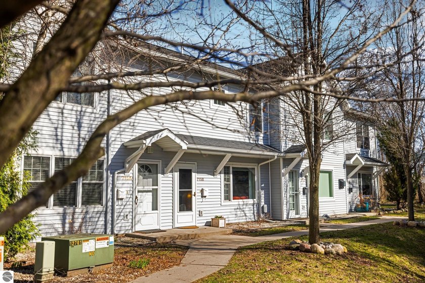 Welcome to 715 Lake Ave Unit B, a fantastic opportunity in the - Beach Condo for sale in Traverse City, Michigan on Beachhouse.com