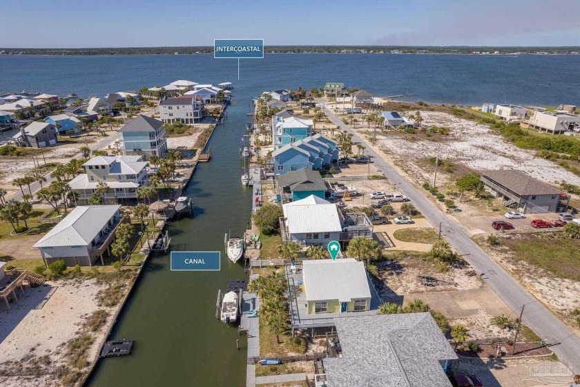 Attention Boaters!  This 80 ft canal front home has a 12,000 lb - Beach Home for sale in Navarre Beach, Florida on Beachhouse.com