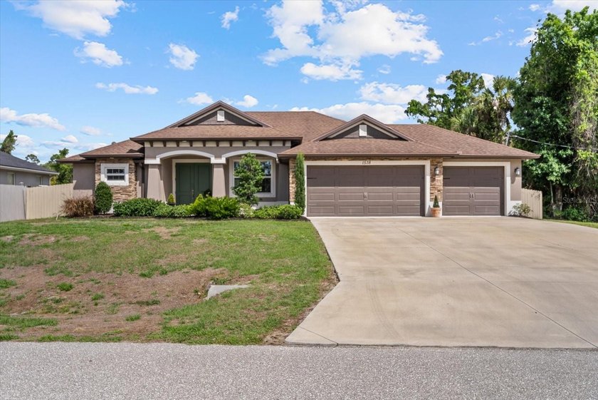 Welcome to this beautifully appointed Zwiercan Homes residence - Beach Home for sale in North Port, Florida on Beachhouse.com