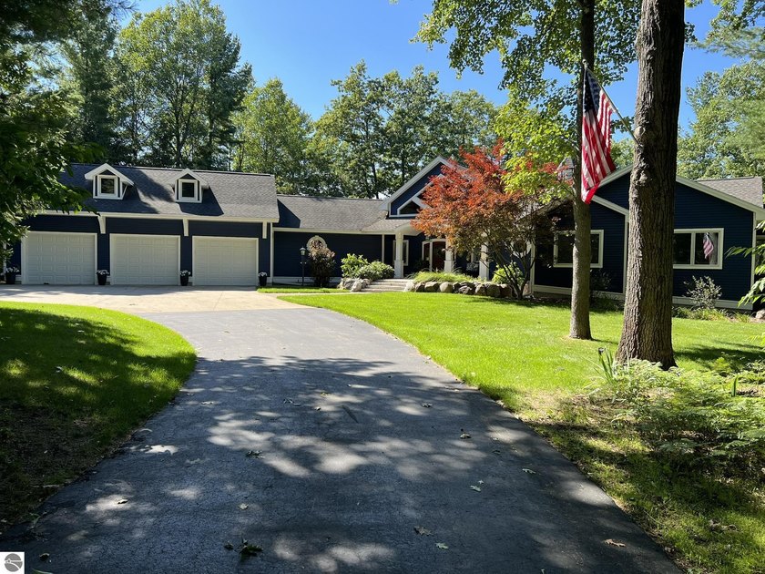 On Golden Pond! A rare opportunity: 563 ft of waterfront, 3.2 - Beach Home for sale in Traverse City, Michigan on Beachhouse.com