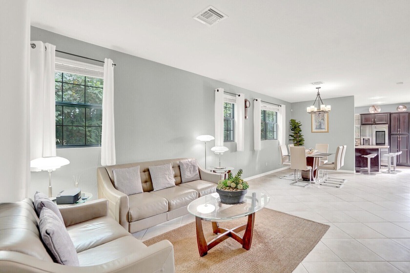 Situated within the prestigious Gramercy Square community, this - Beach Townhome/Townhouse for sale in Delray Beach, Florida on Beachhouse.com