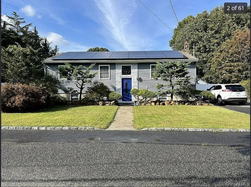 TOTALLY UPDATED SPACIOUS 2652 SQ. FT. HI RANCH WITH NEW SOLAR - Beach Home for sale in Wading River, New York on Beachhouse.com