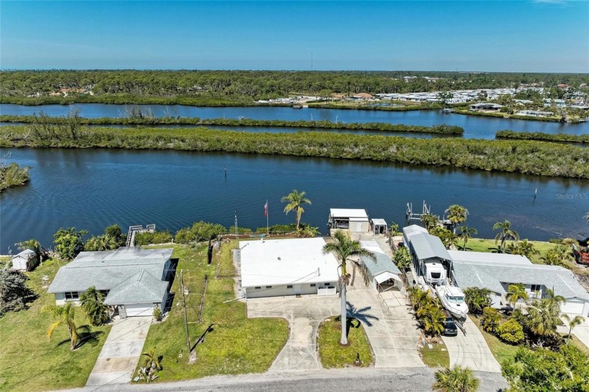 This waterfront home offers incredible potential, situated on a - Beach Home for sale in Nokomis, Florida on Beachhouse.com