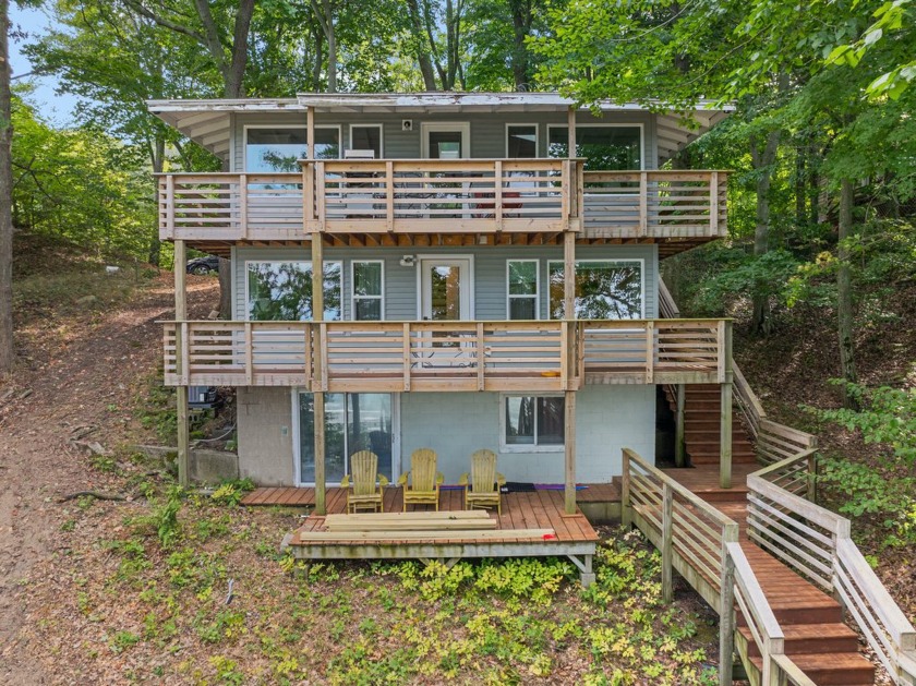 A secluded retreat on one of Lake Michigan's finest sugar-sand - Beach Home for sale in Muskegon, Michigan on Beachhouse.com