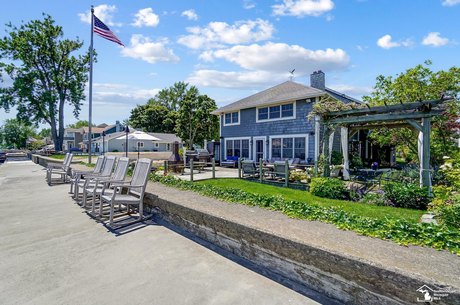 Prepare to be in awe of this beautifully designed Luxury Lake - Beach Home for sale in La Salle, Michigan on Beachhouse.com