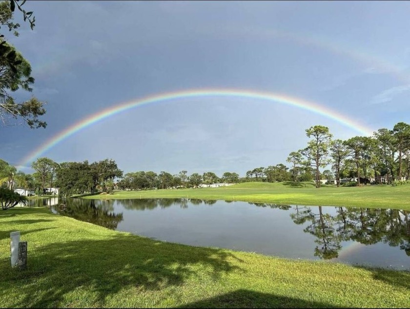 This completely remodeled, stucco Palm Harbor home is located on - Beach Home for sale in North Fort Myers, Florida on Beachhouse.com
