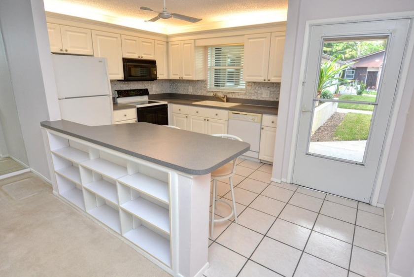 WONDERFUL CBS CORNER 55+ VILLA A-101!UPDATED WHITE KITCHEN WITH - Beach Home for sale in Stuart, Florida on Beachhouse.com