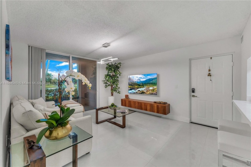 AMAZING FULLY REMODELED 2 BEDROOM 1 BATHROOM 1ST FLOOR CORNER - Beach Condo for sale in Miramar, Florida on Beachhouse.com