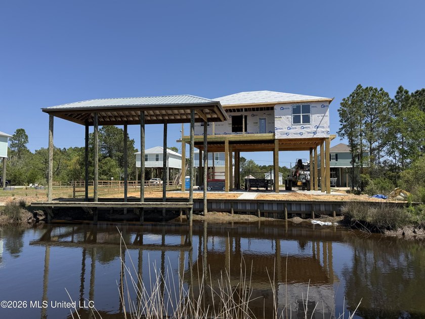 Beautiful canal-front home just minutes from downtown Bay St - Beach Home for sale in Bay Saint Louis, Mississippi on Beachhouse.com