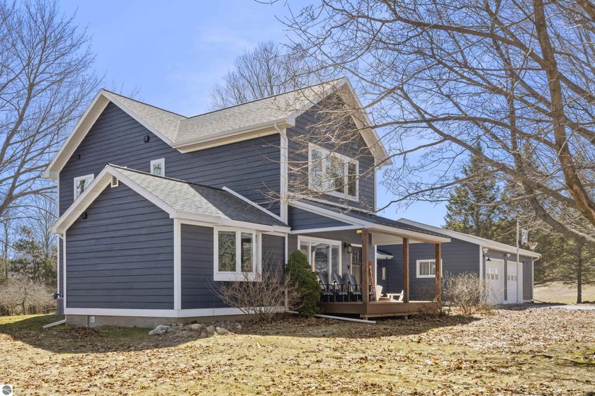 Completely renovated in 2022, this beautifully updated Onekama - Beach Home for sale in Onekama, Michigan on Beachhouse.com