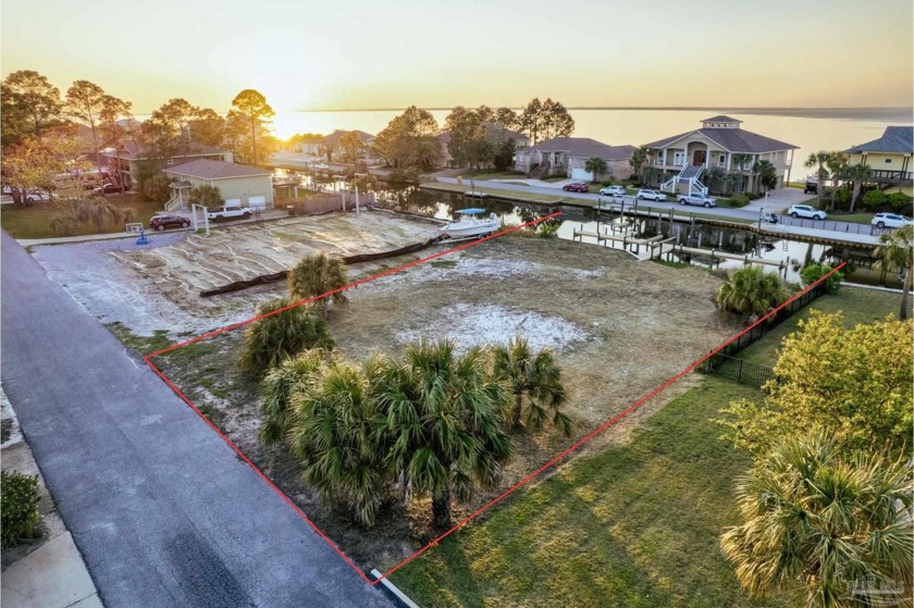 Right on the beautiful, deep water canal in Whisper Bay, this - Beach Lot for sale in Gulf Breeze, Florida on Beachhouse.com