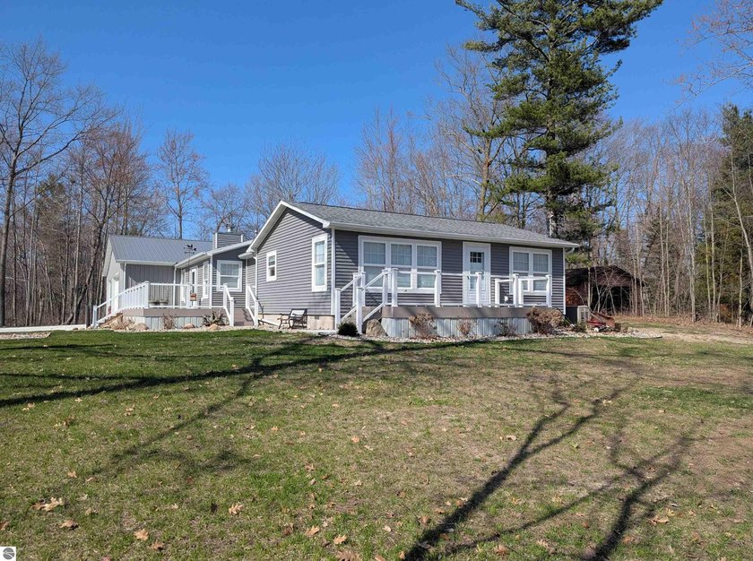 Just a few steps away from the beautiful sandy shores of Lake - Beach Home for sale in Au Gres, Michigan on Beachhouse.com