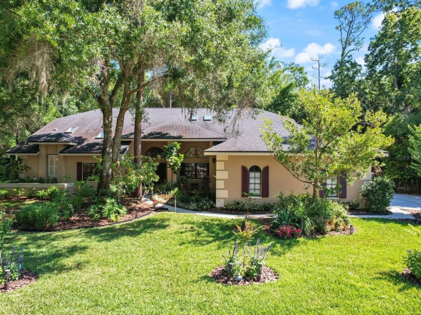 This home is located within a gated GOLF course community - Beach Home for sale in Oldsmar, Florida on Beachhouse.com