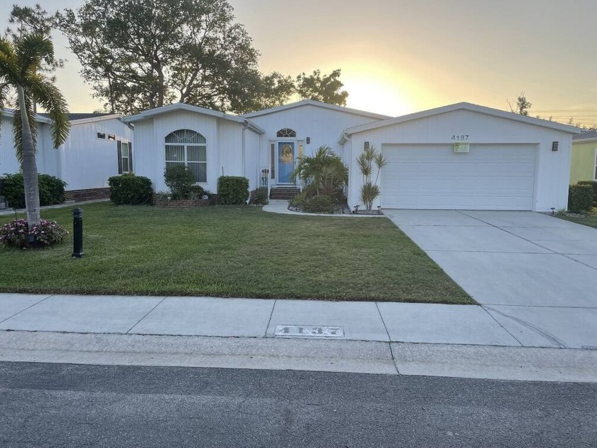 This nice Triple wide home has 3-bedroom and 2-bathrooms with - Beach Home for sale in North Fort Myers, Florida on Beachhouse.com