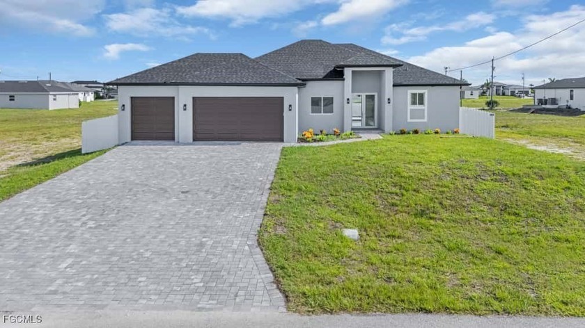 Stunning new construction Florence 3 car garage model W/ POOL in - Beach Home for sale in Cape Coral, Florida on Beachhouse.com