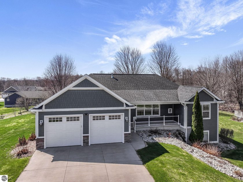 Welcome home to this thoughtfully designed ranch home located in - Beach Home for sale in Traverse City, Michigan on Beachhouse.com
