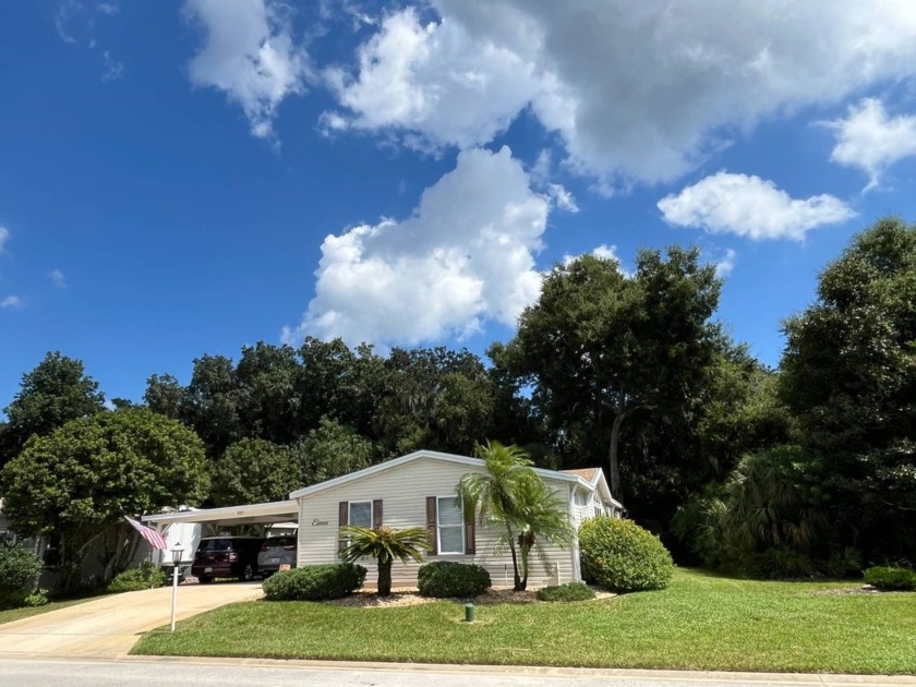 This Plantation Oaks home is situated on an oversized lot with a - Beach Home for sale in Flagler Beach, Florida on Beachhouse.com