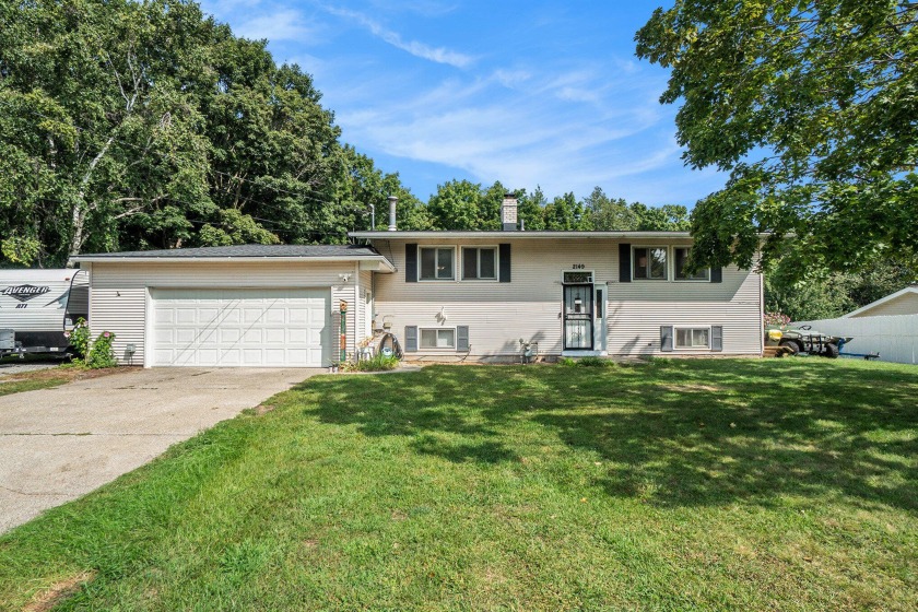 Discover your ideal home just moments from Lake Michigan! This - Beach Home for sale in Holland, Michigan on Beachhouse.com