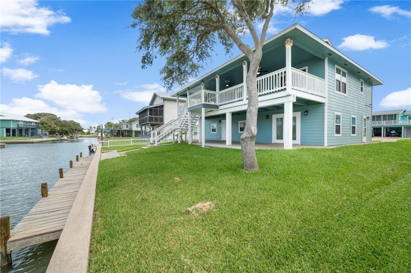 This beautifully remodeled canal-front retreat home offers you - Beach Home for sale in Rockport, Texas on Beachhouse.com