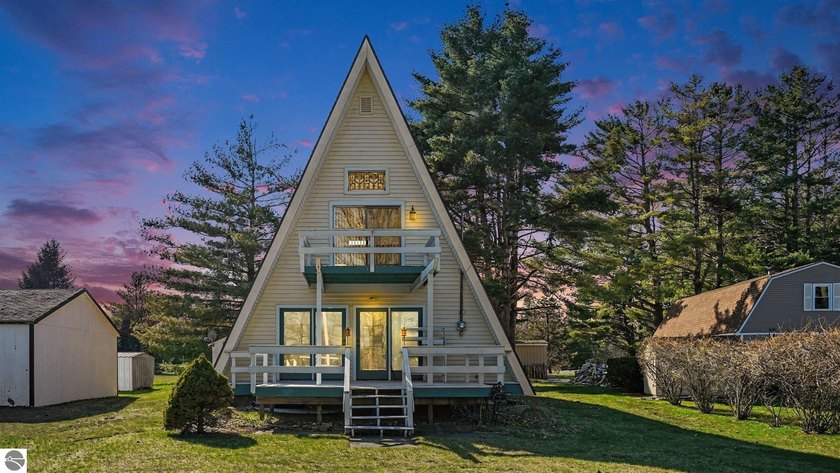 Welcome to lake life on all-sports Cedar Lake! This charming 1 - Beach Home for sale in Greenbush, Michigan on Beachhouse.com