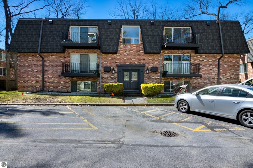 Welcome to this stylish and conveniently located 2-bedroom - Beach Condo for sale in Traverse City, Michigan on Beachhouse.com