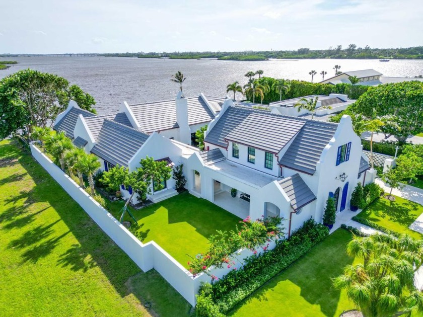 This newly constructed 2023 Dutch Colonial residence, situated - Beach Home for sale in Palm Beach, Florida on Beachhouse.com