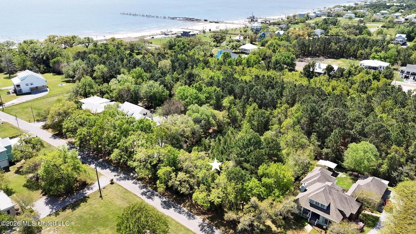 Tucked away just off N Beach Blvd, this beautiful .53-acre - Beach Lot for sale in Waveland, Mississippi on Beachhouse.com